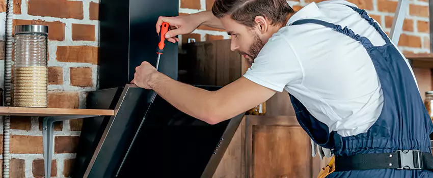 Old Rusted Metal Fireplace Repair And Replacement in Crystal Lake, AB
